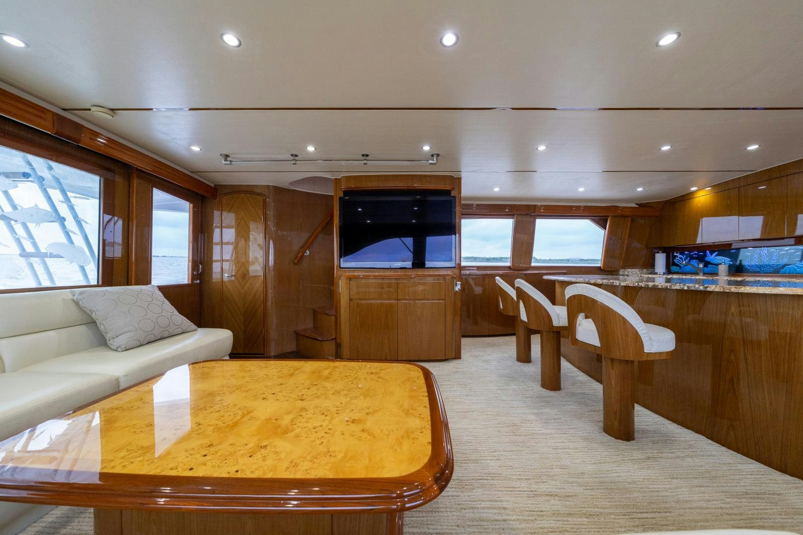 a room with a couch and a table aboard MM CRICKET Yacht for Sale