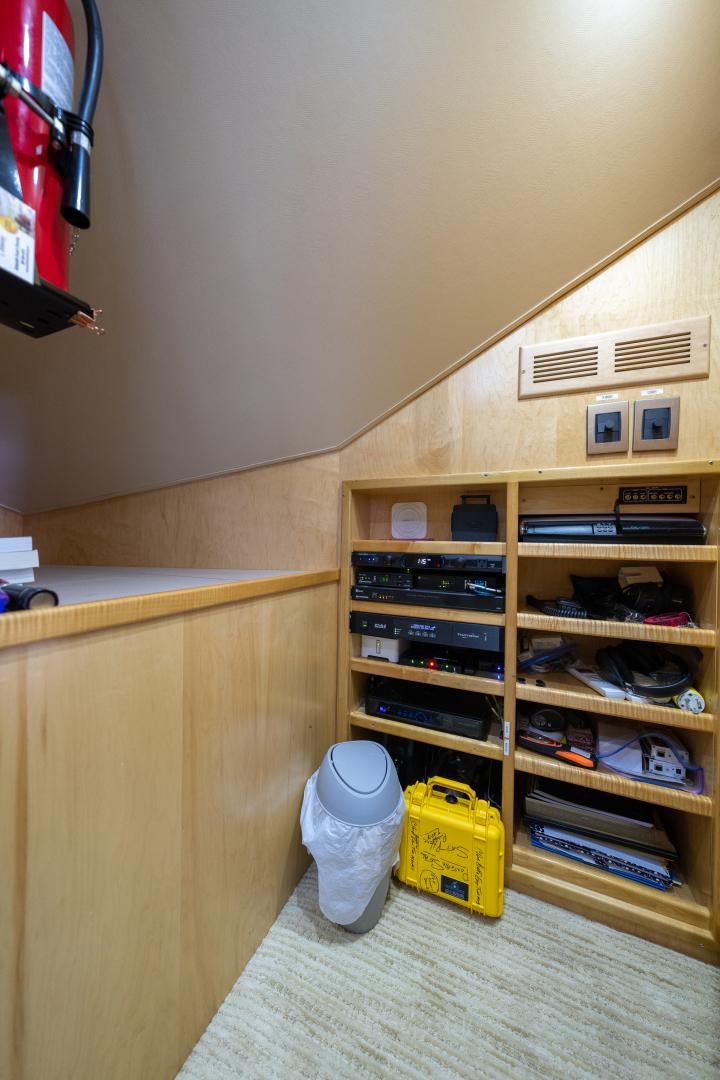 a room with shelves and a trash can aboard MM CRICKET Yacht for Sale