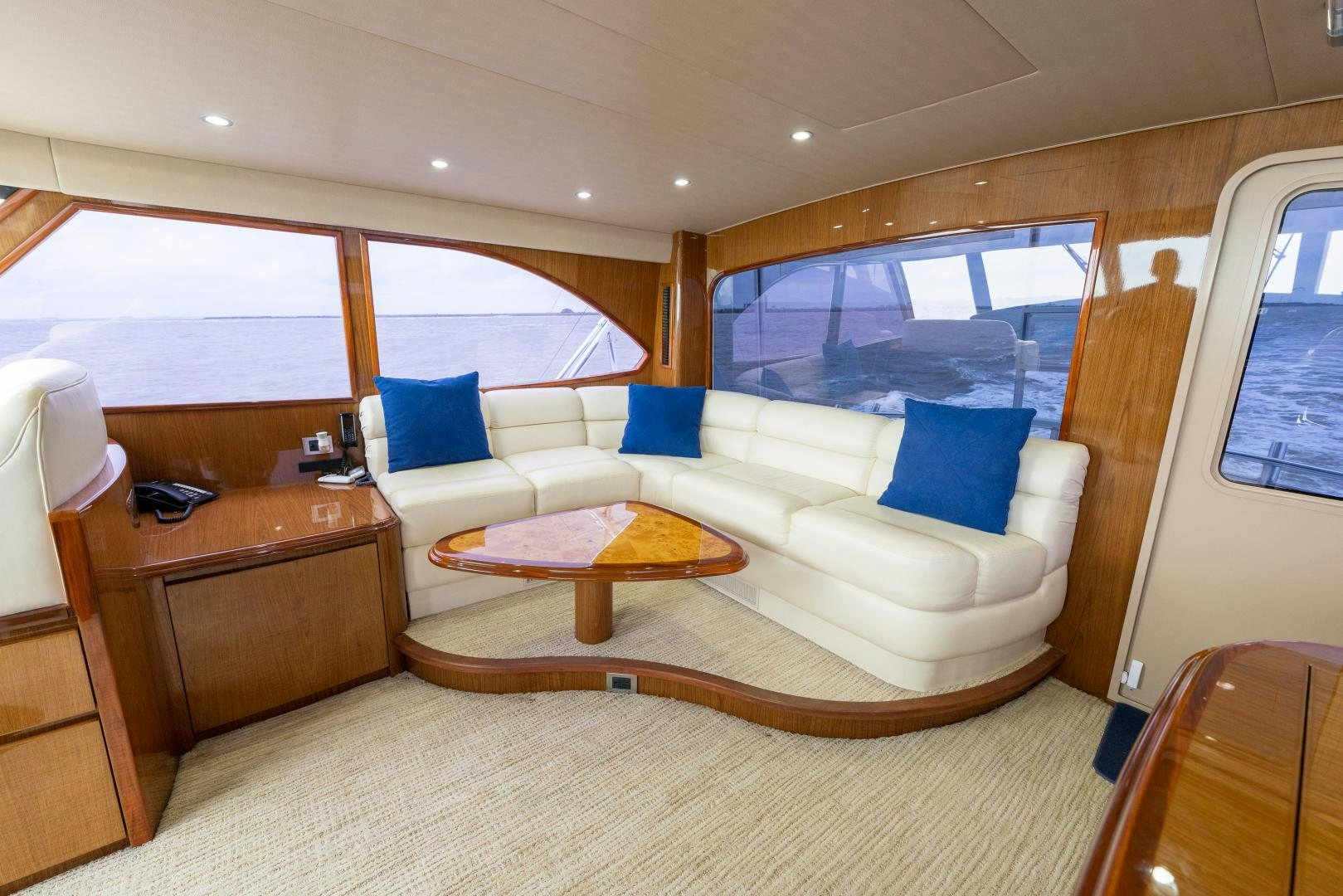 a room with a bed and a table aboard MM CRICKET Yacht for Sale