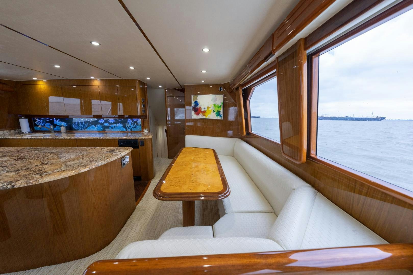 a room with a couch and a table aboard MM CRICKET Yacht for Sale