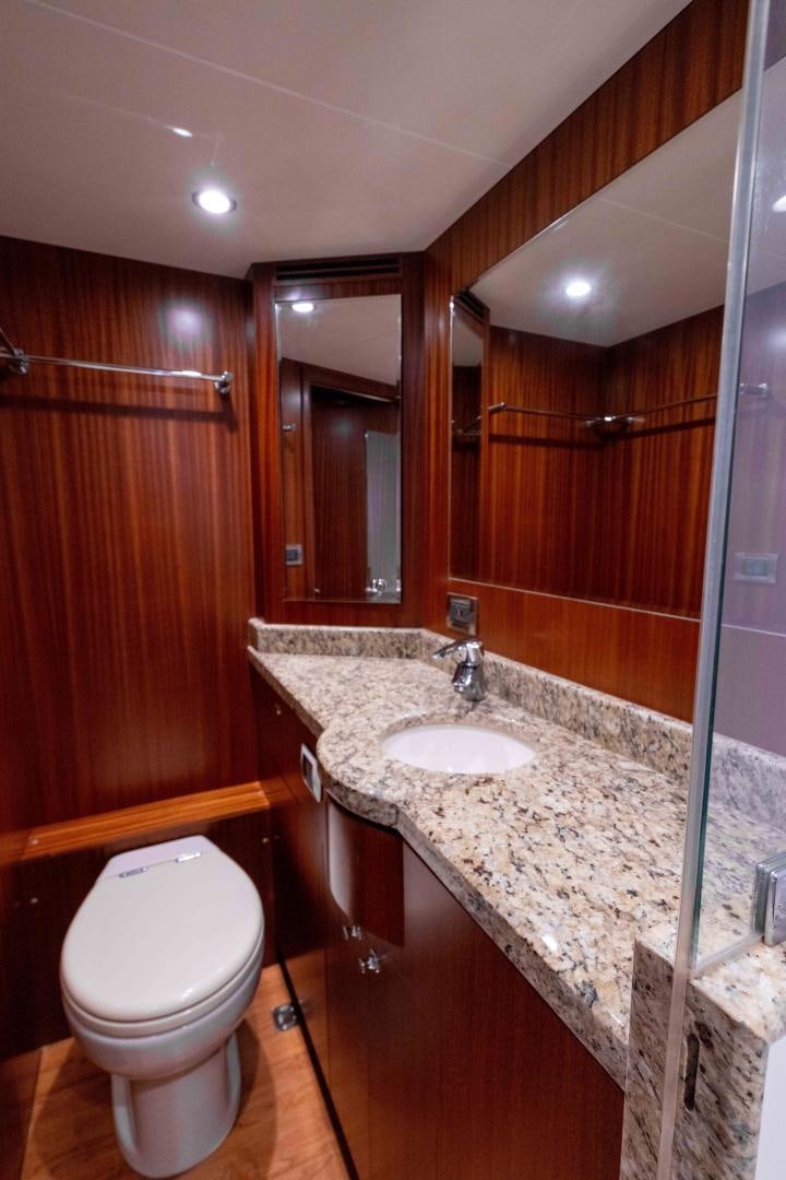 a bathroom with a sink and a toilet aboard RHYTHM'N BLUES Yacht for Sale