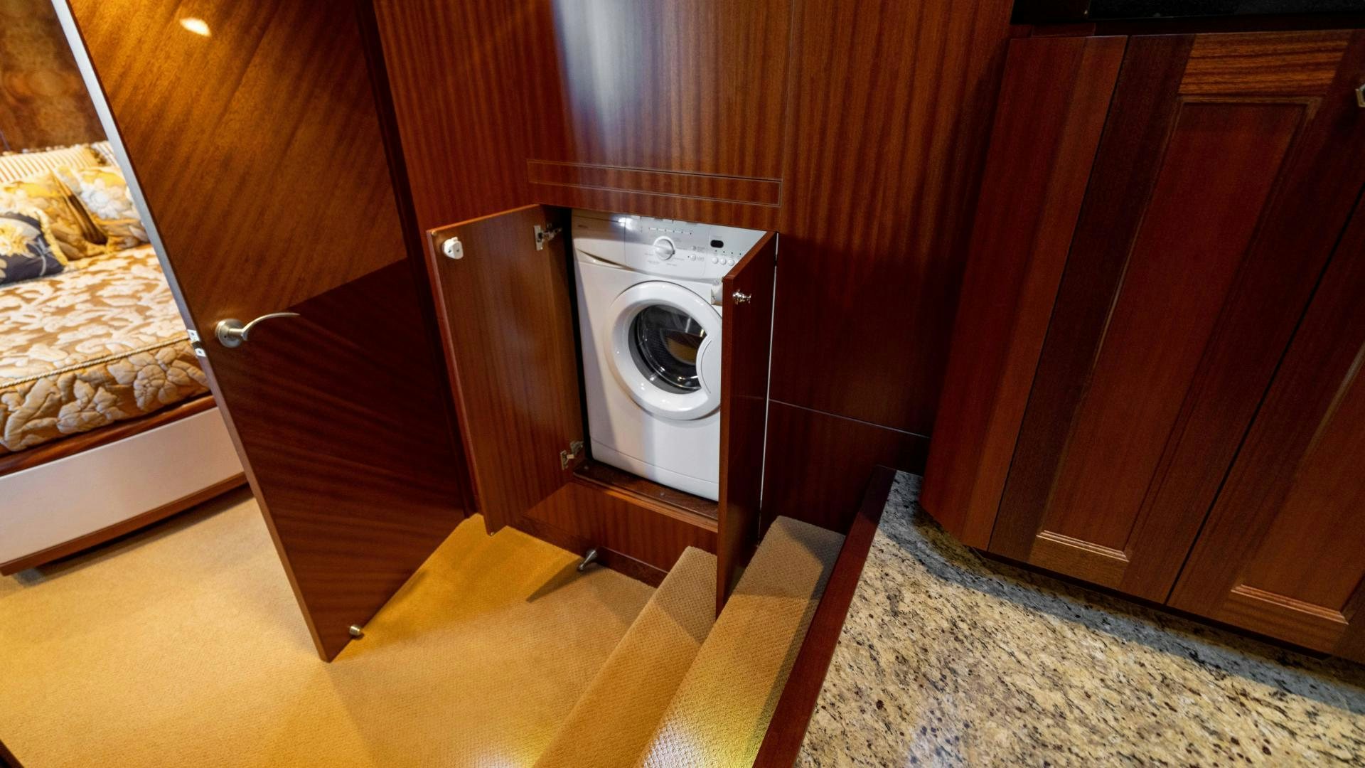 a washing machine in a room aboard RHYTHM'N BLUES Yacht for Sale