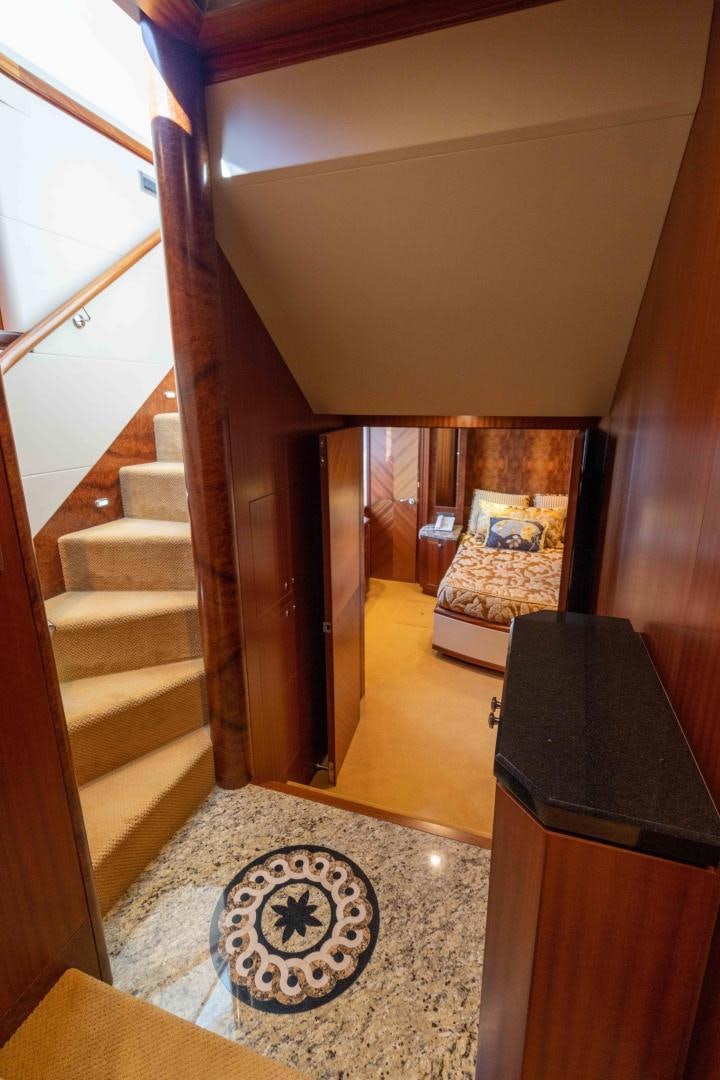 a staircase with a rug aboard RHYTHM'N BLUES Yacht for Sale