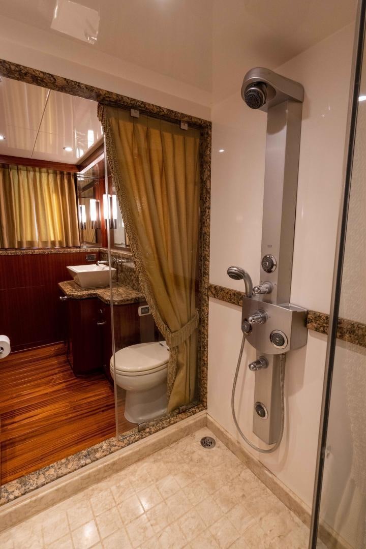 a bathroom with a sink toilet and shower aboard RHYTHM'N BLUES Yacht for Sale