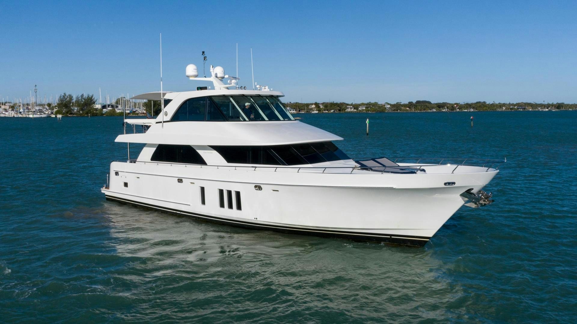 a white boat in the water aboard RHYTHM'N BLUES Yacht for Sale