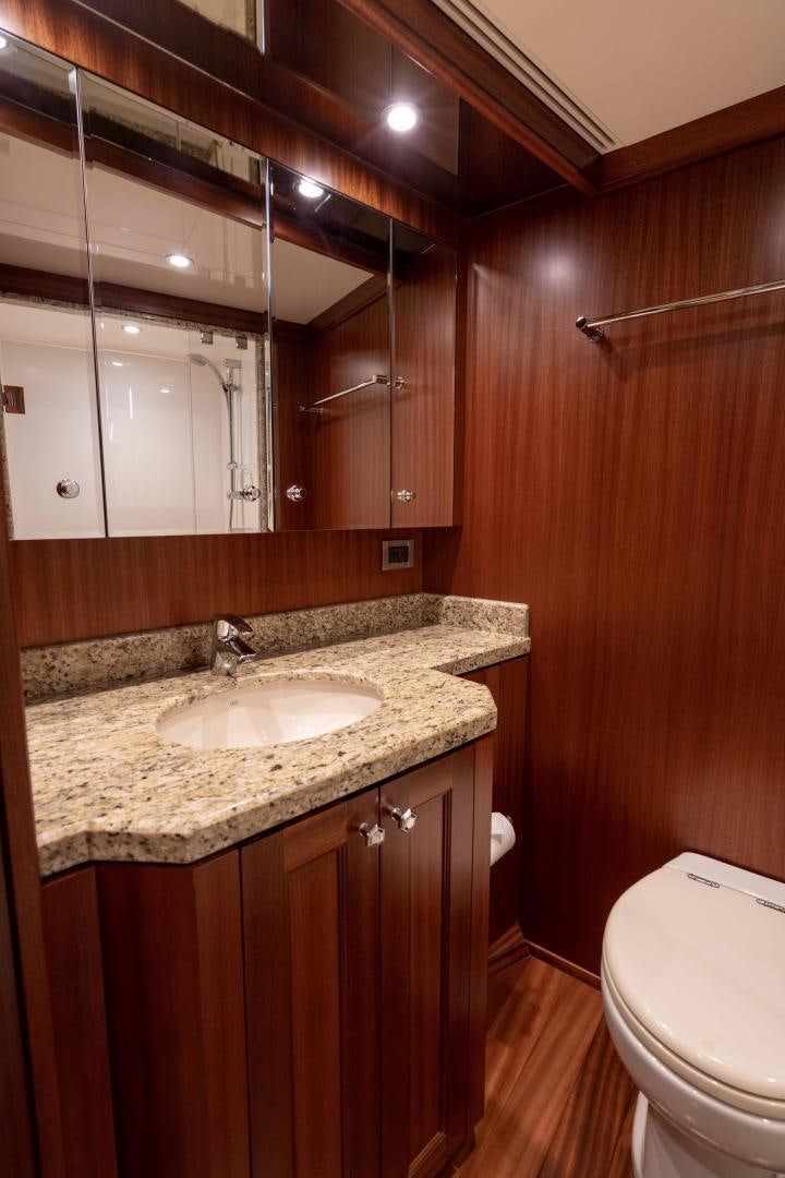 a bathroom with a sink and a mirror aboard RHYTHM'N BLUES Yacht for Sale