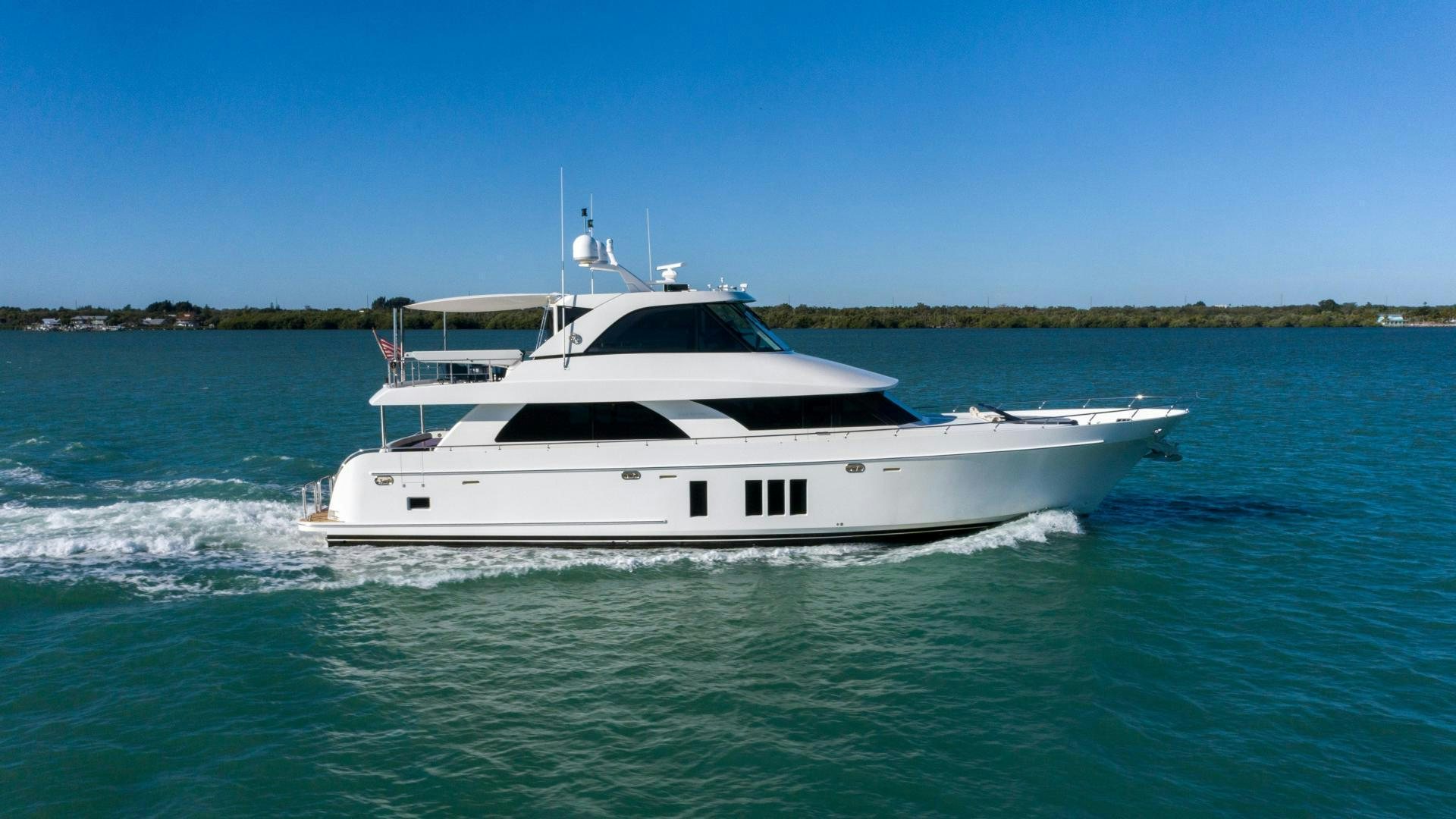 a white boat in the water aboard RHYTHM'N BLUES Yacht for Sale