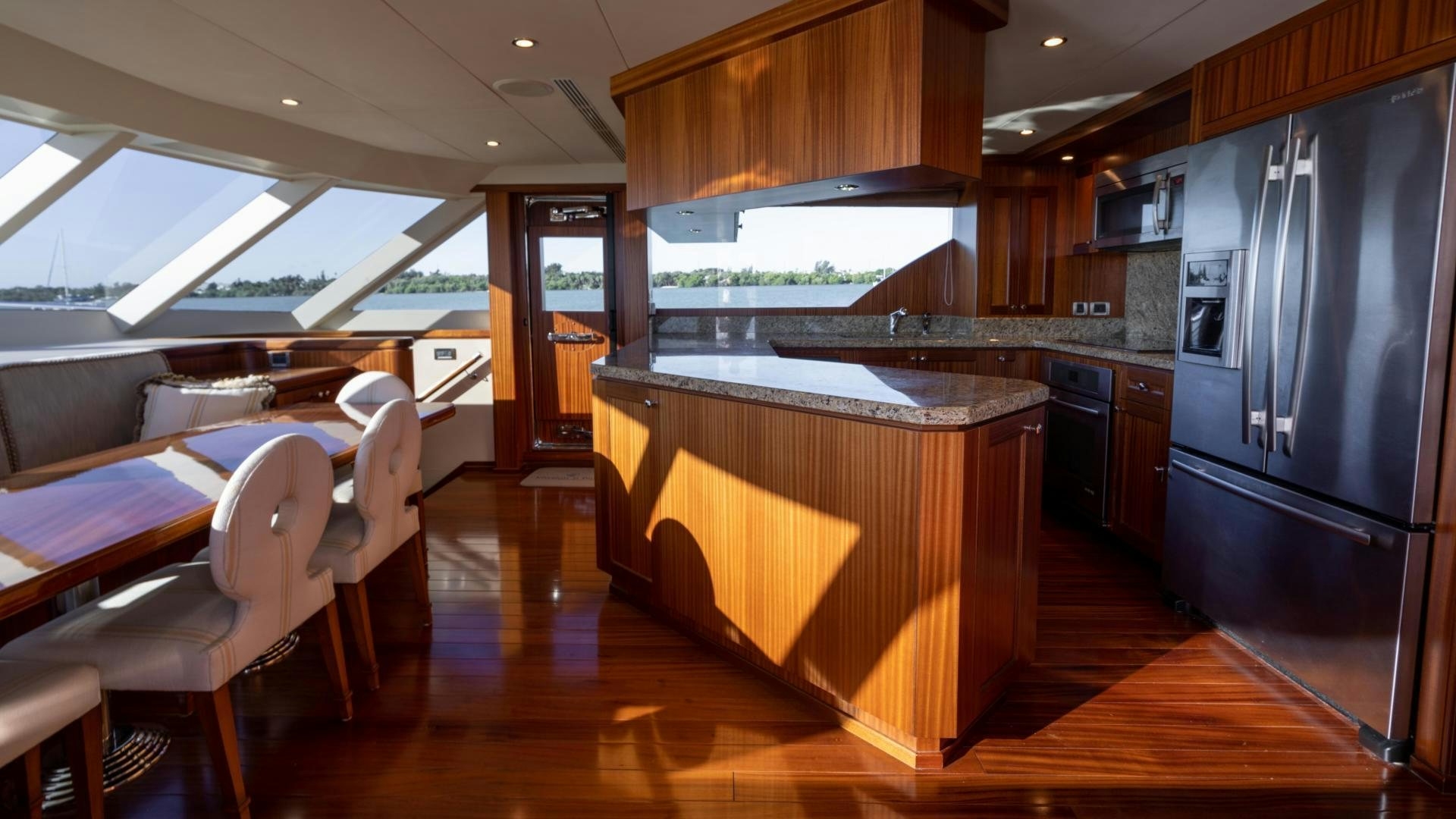 a kitchen with a large island aboard RHYTHM'N BLUES Yacht for Sale