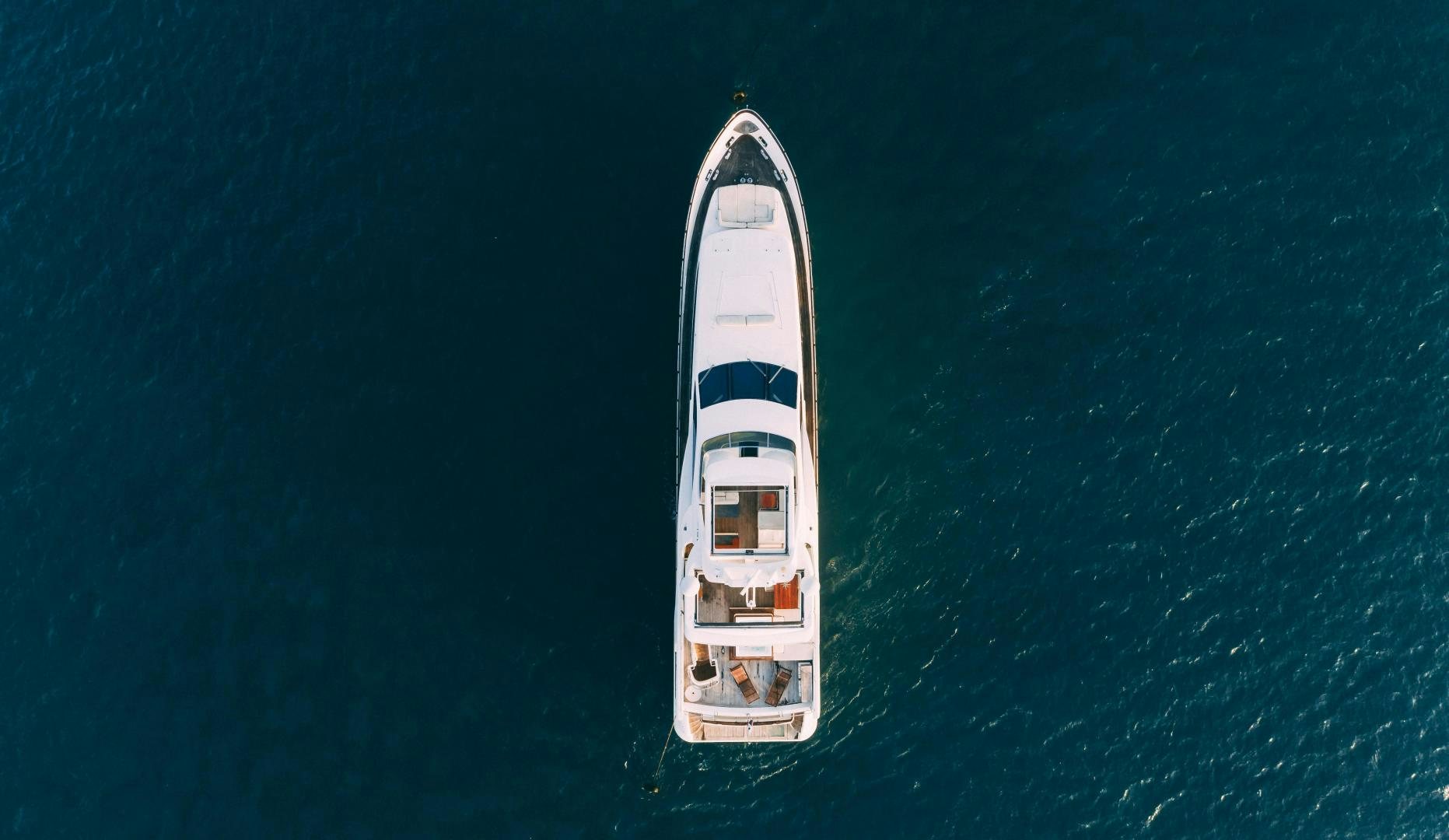 a white boat in the water aboard CAMY ED Yacht for Sale