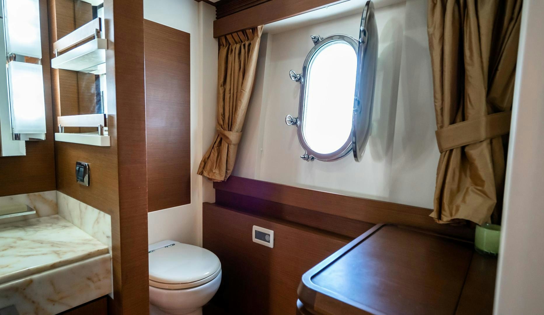 a bathroom with a sink and toilet aboard CAMY ED Yacht for Sale