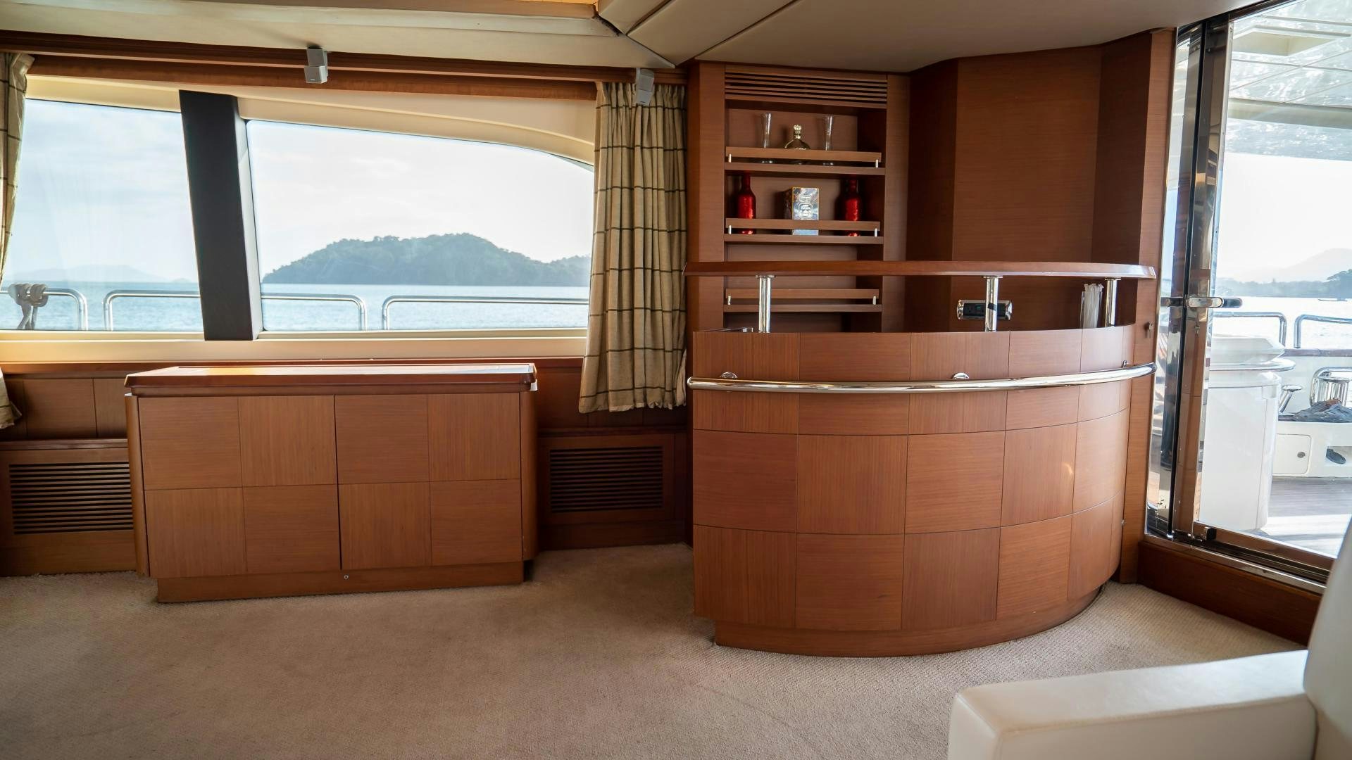 a room with wooden cabinets aboard CAMY ED Yacht for Sale