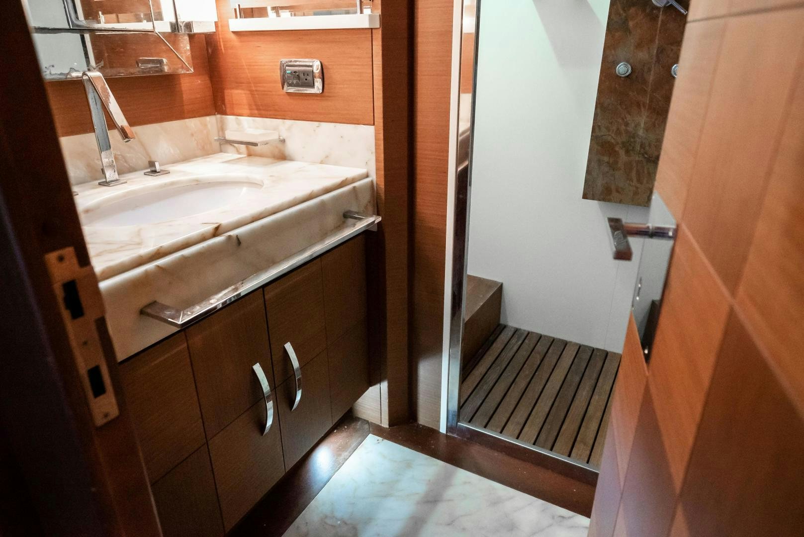 a bathroom with a sink and a bathtub aboard CAMY ED Yacht for Sale