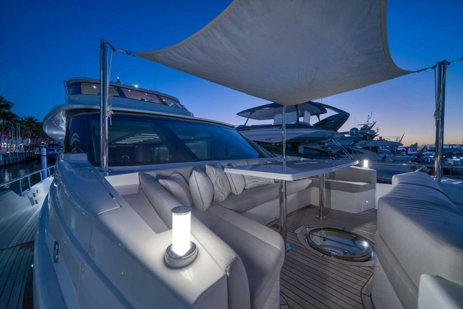 a white car with a large hood aboard VALIANT Yacht for Sale