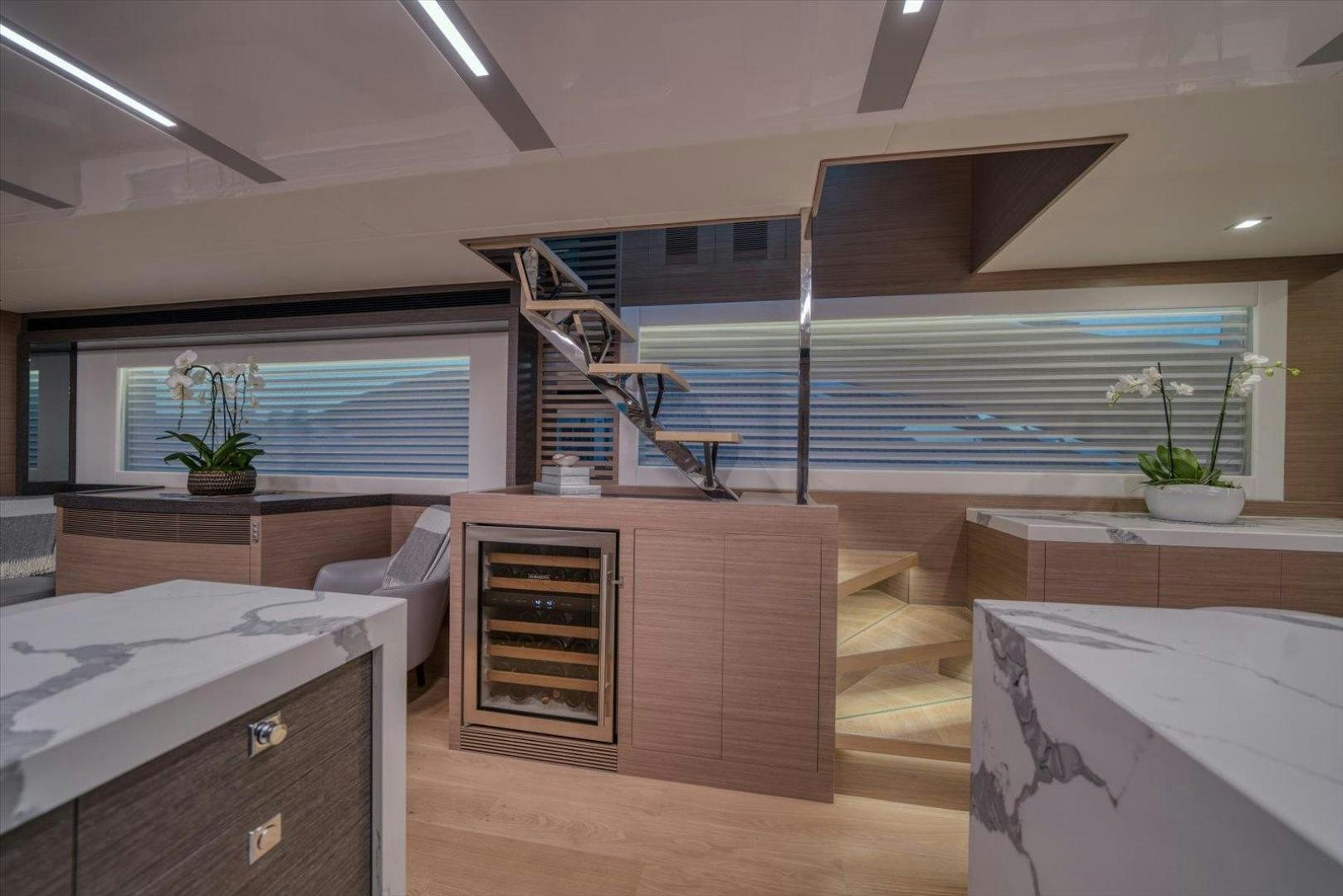 a room with a bed and a ladder aboard VALIANT Yacht for Sale