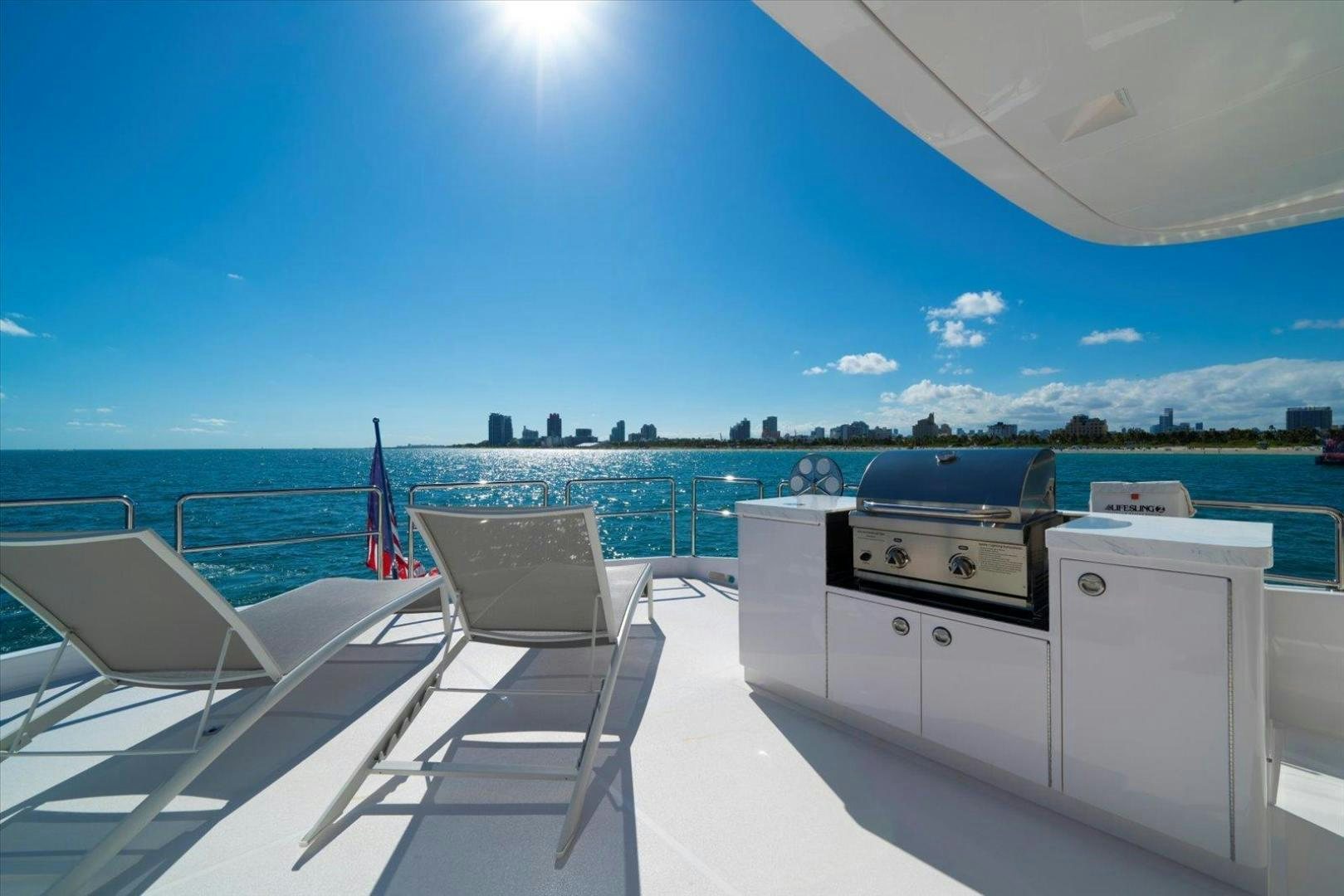 a white chair on a boat aboard VALIANT Yacht for Sale