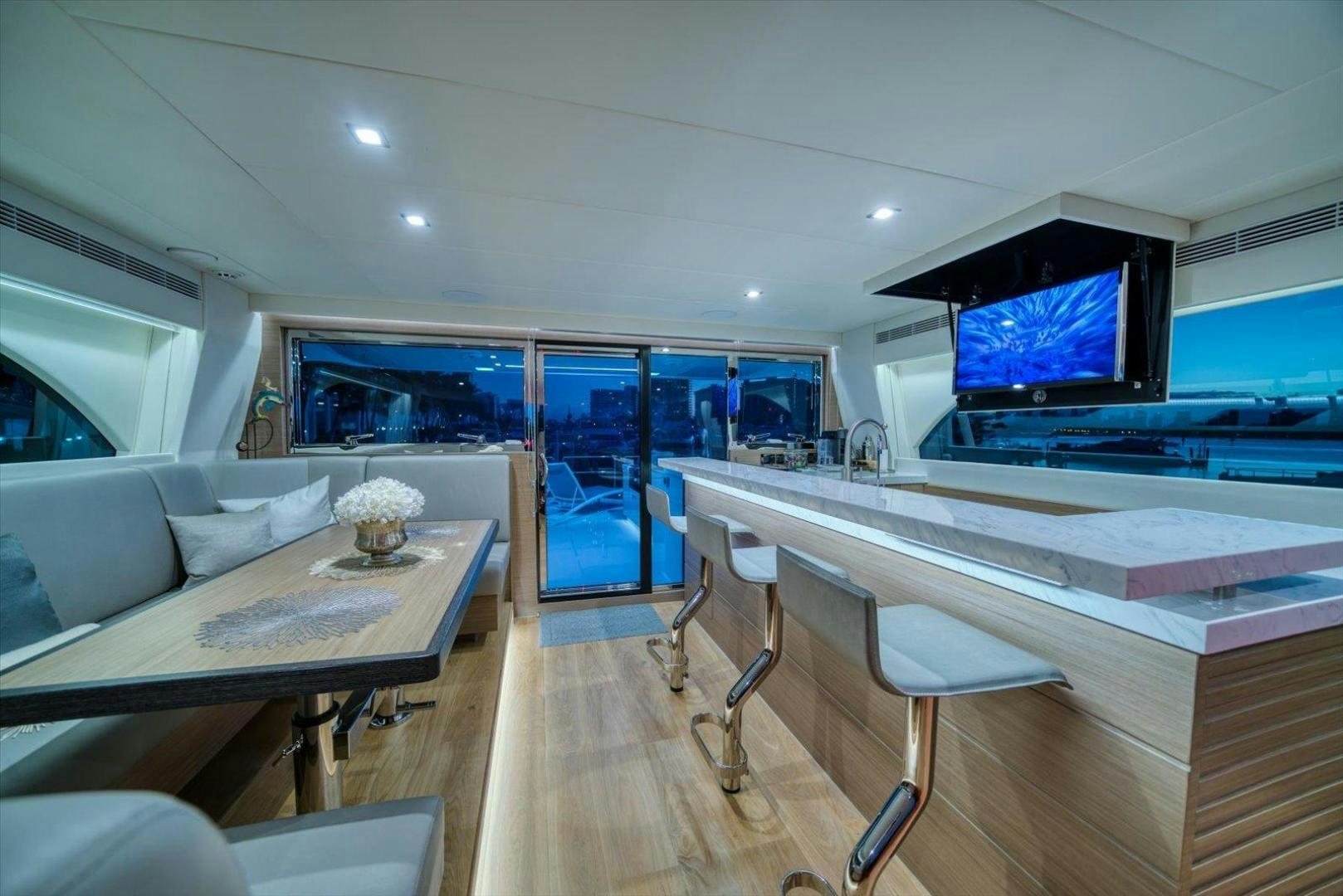 a large kitchen with a large island aboard VALIANT Yacht for Sale