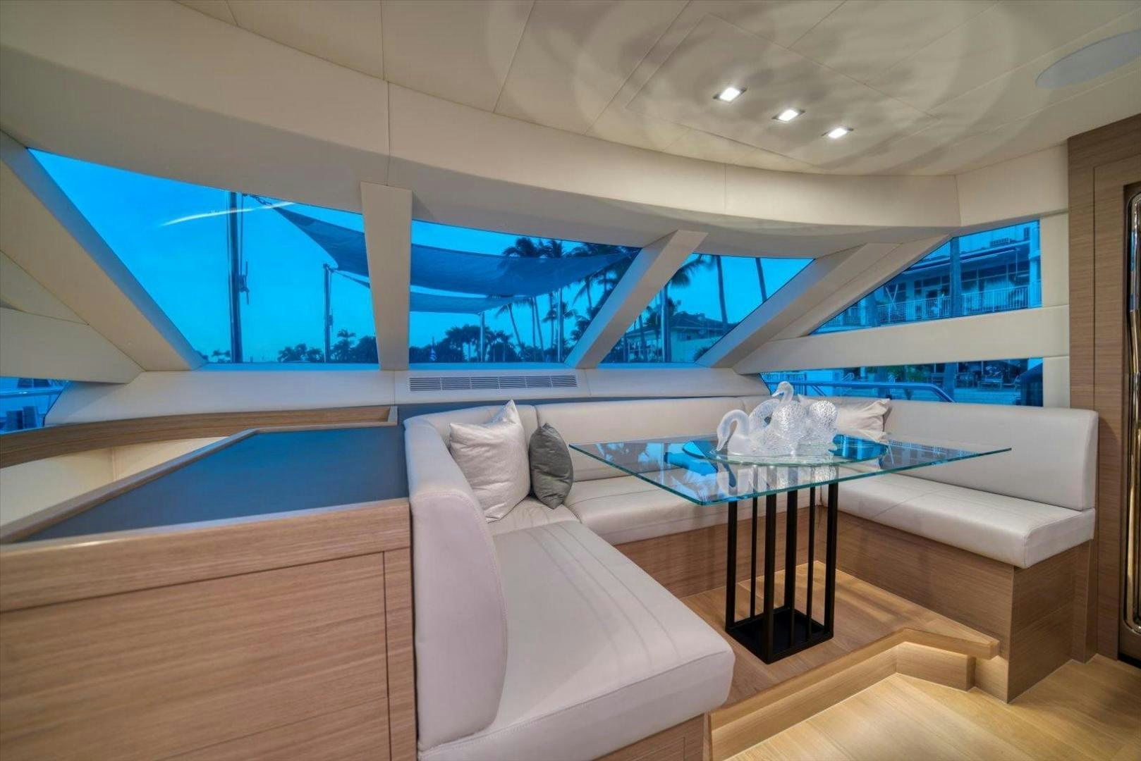 a room with a couch and a table aboard VALIANT Yacht for Sale