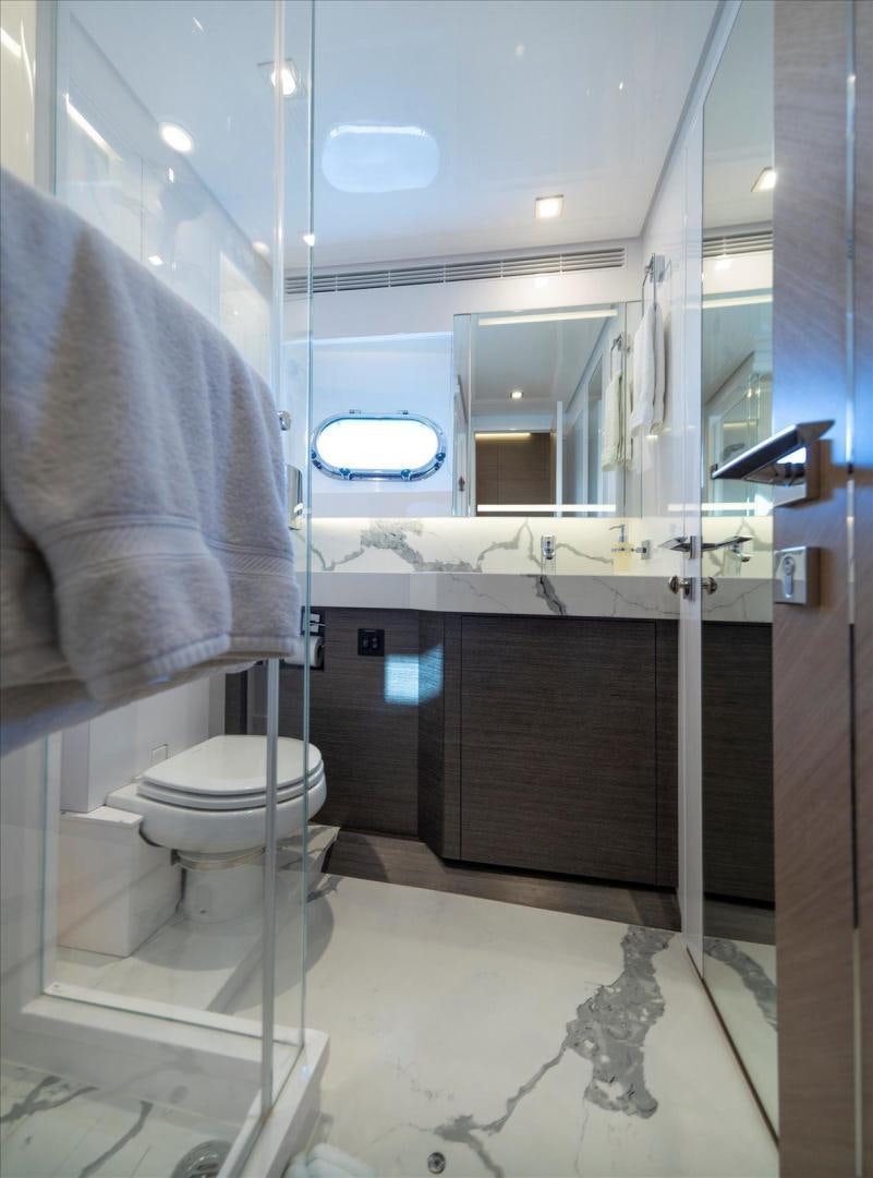 a bathroom with a towel on the wall aboard VALIANT Yacht for Sale