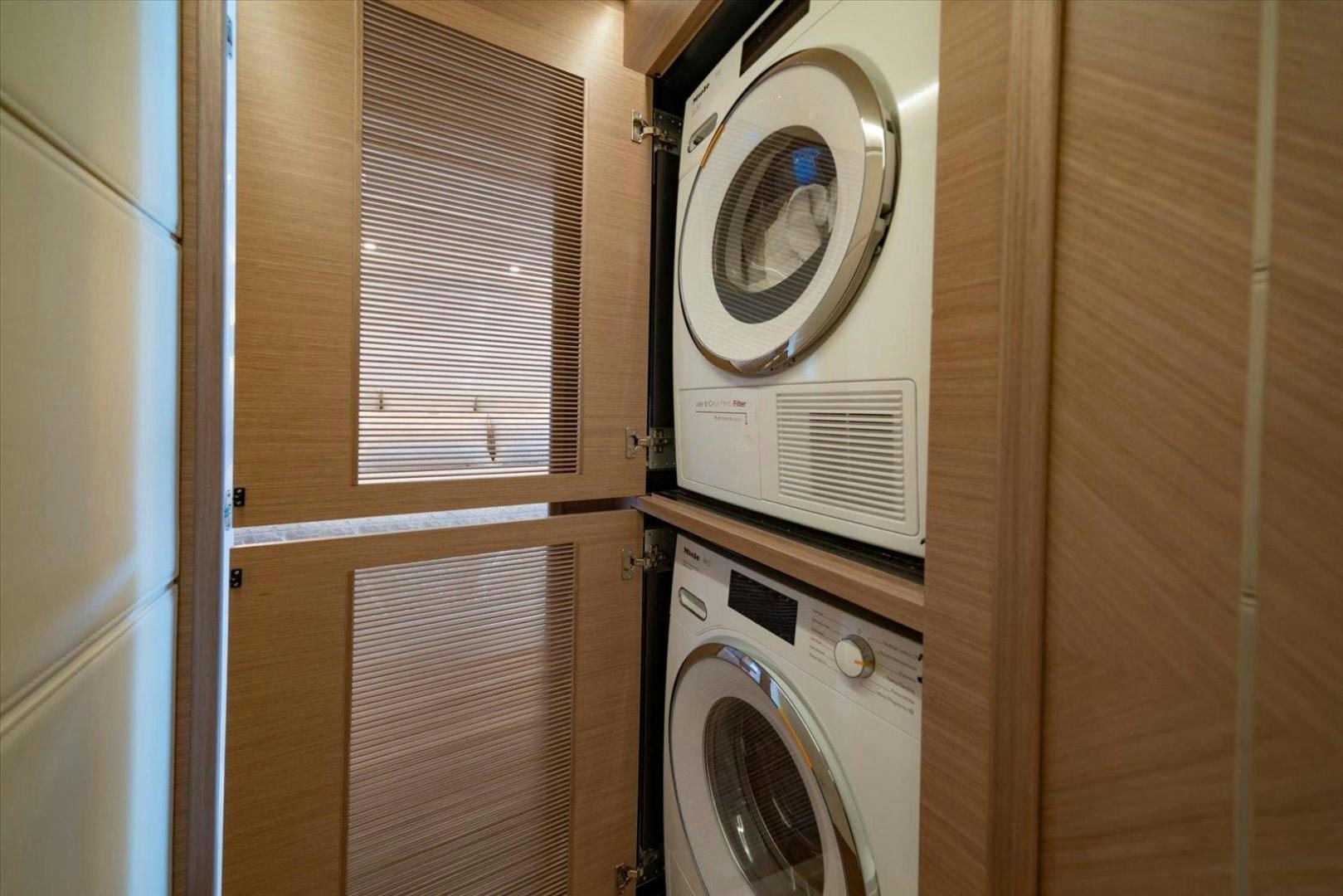 a washer and dryer in a room aboard VALIANT Yacht for Sale
