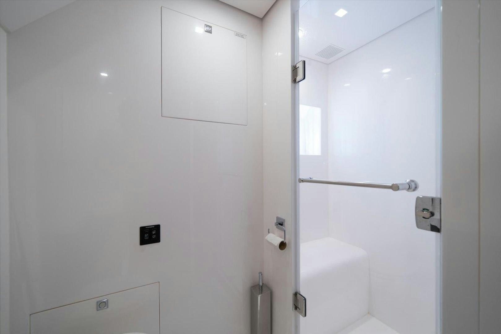 a white door with a handle aboard VALIANT Yacht for Sale