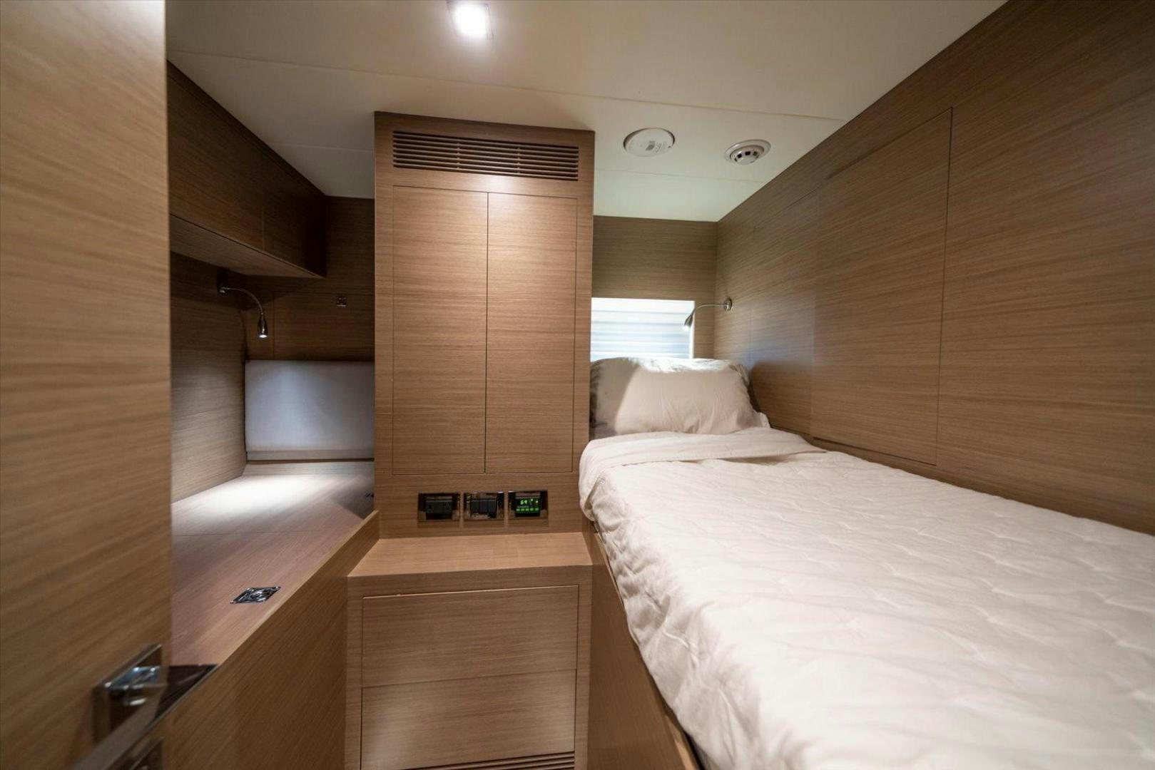 a bedroom with a bed aboard VALIANT Yacht for Sale