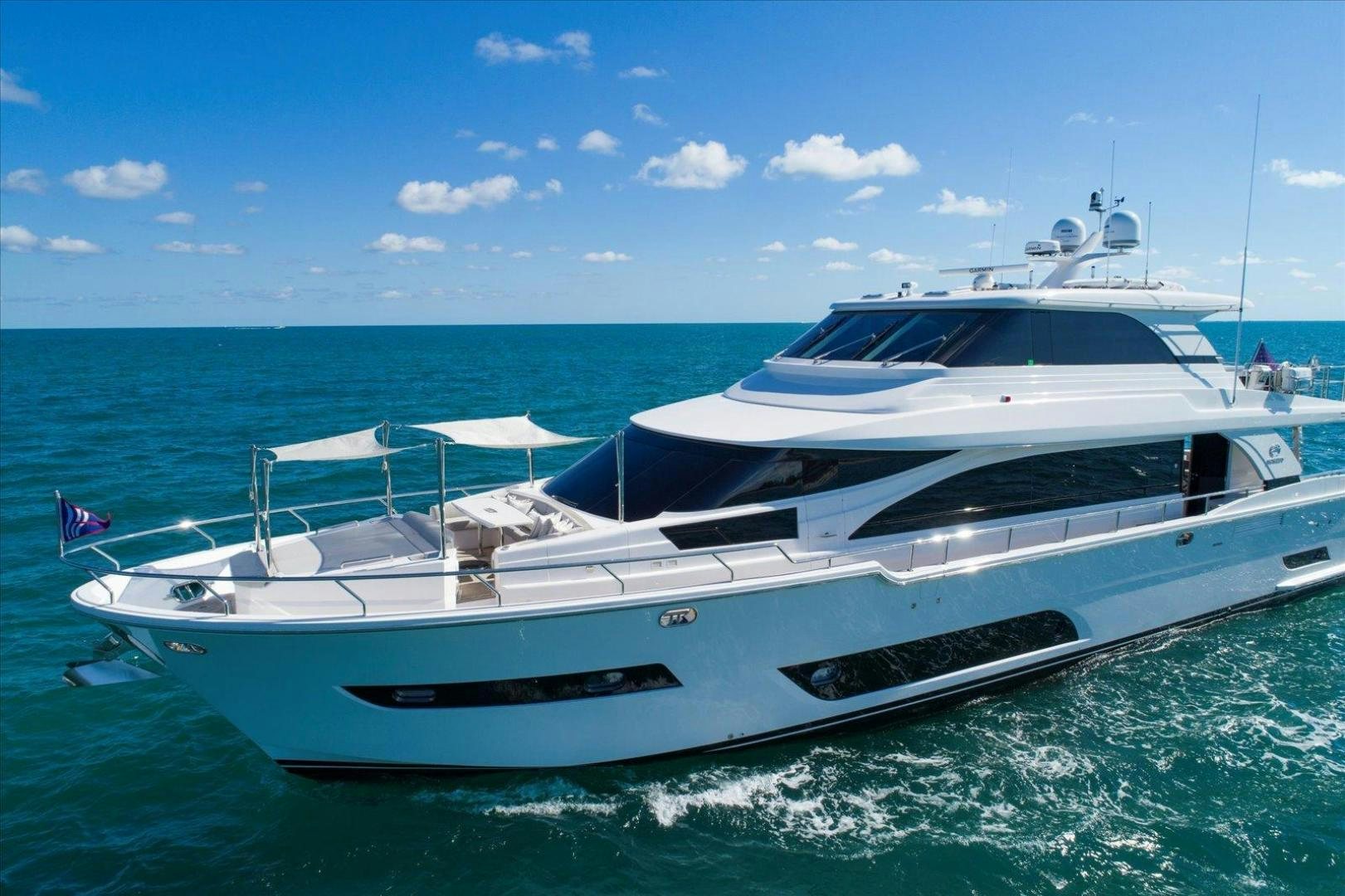 a white yacht on the water aboard VALIANT Yacht for Sale