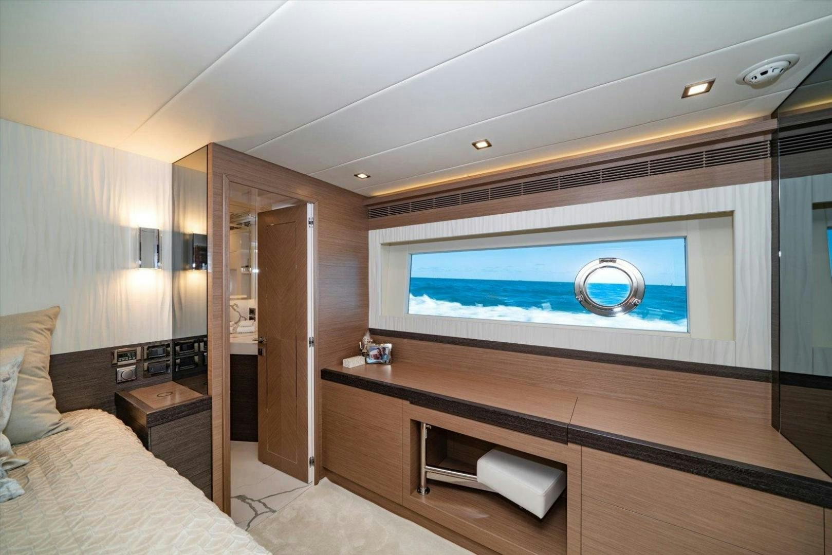 a room with a tv and a bed aboard VALIANT Yacht for Sale