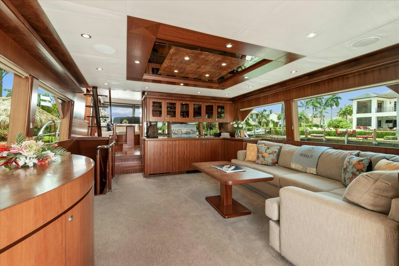 a living room with a large open window aboard Goodlife Yacht for Sale
