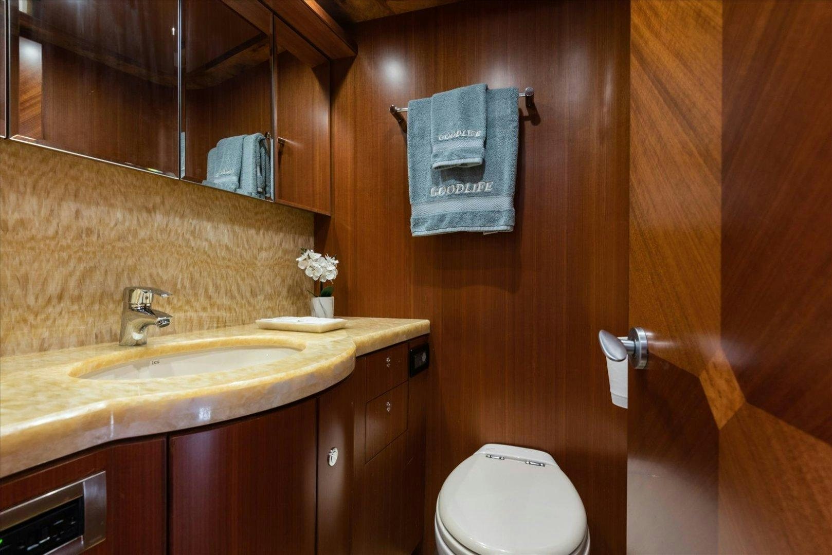 a bathroom with a sink and toilet aboard Goodlife Yacht for Sale