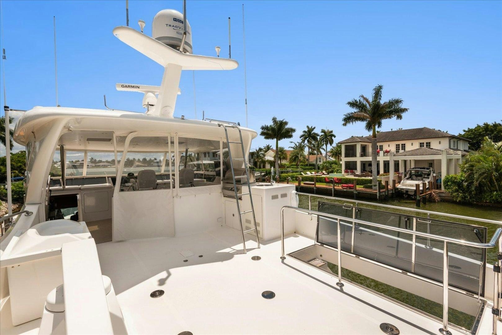 a building with a white roof aboard Goodlife Yacht for Sale