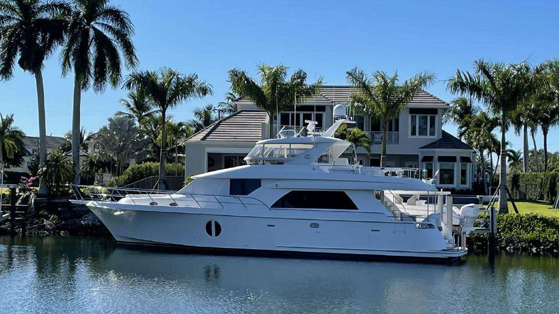 a white yacht in a tropical setting aboard Goodlife Yacht for Sale