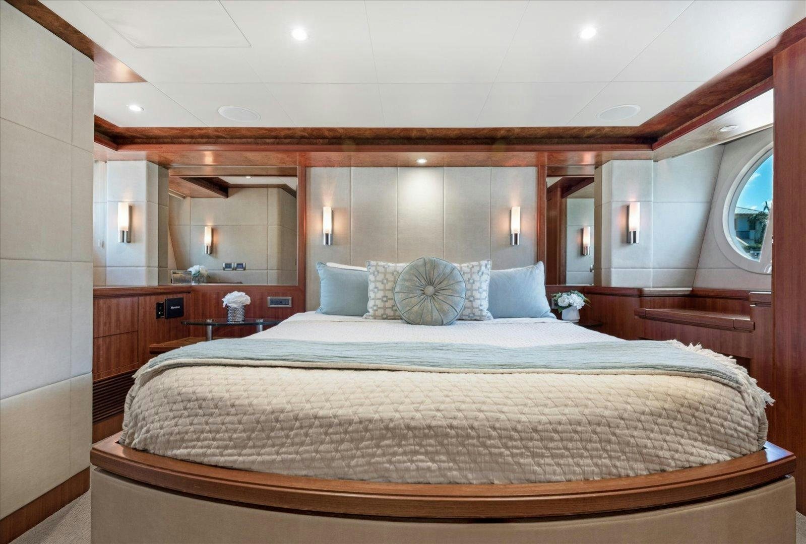 a large bed in a room aboard Goodlife Yacht for Sale