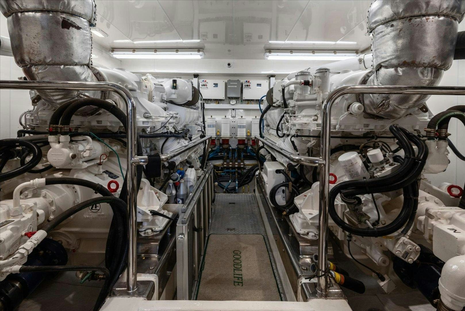 a large room with pipes and valves aboard Goodlife Yacht for Sale