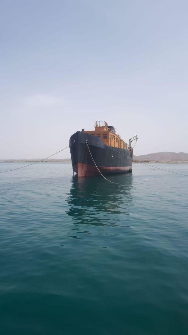 a boat in the water aboard USS WILLIAMSBURG Yacht for Sale