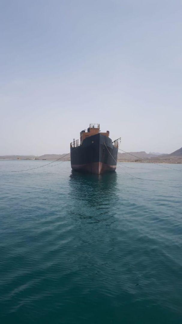 a boat in the water aboard USS WILLIAMSBURG Yacht for Sale
