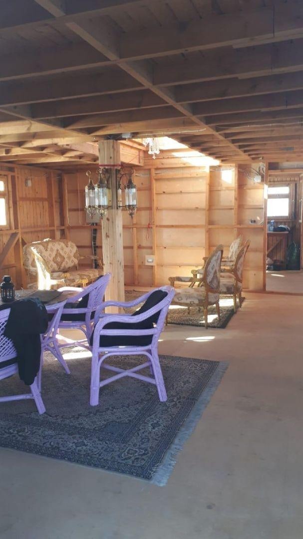 a room with chairs and a table aboard USS WILLIAMSBURG Yacht for Sale