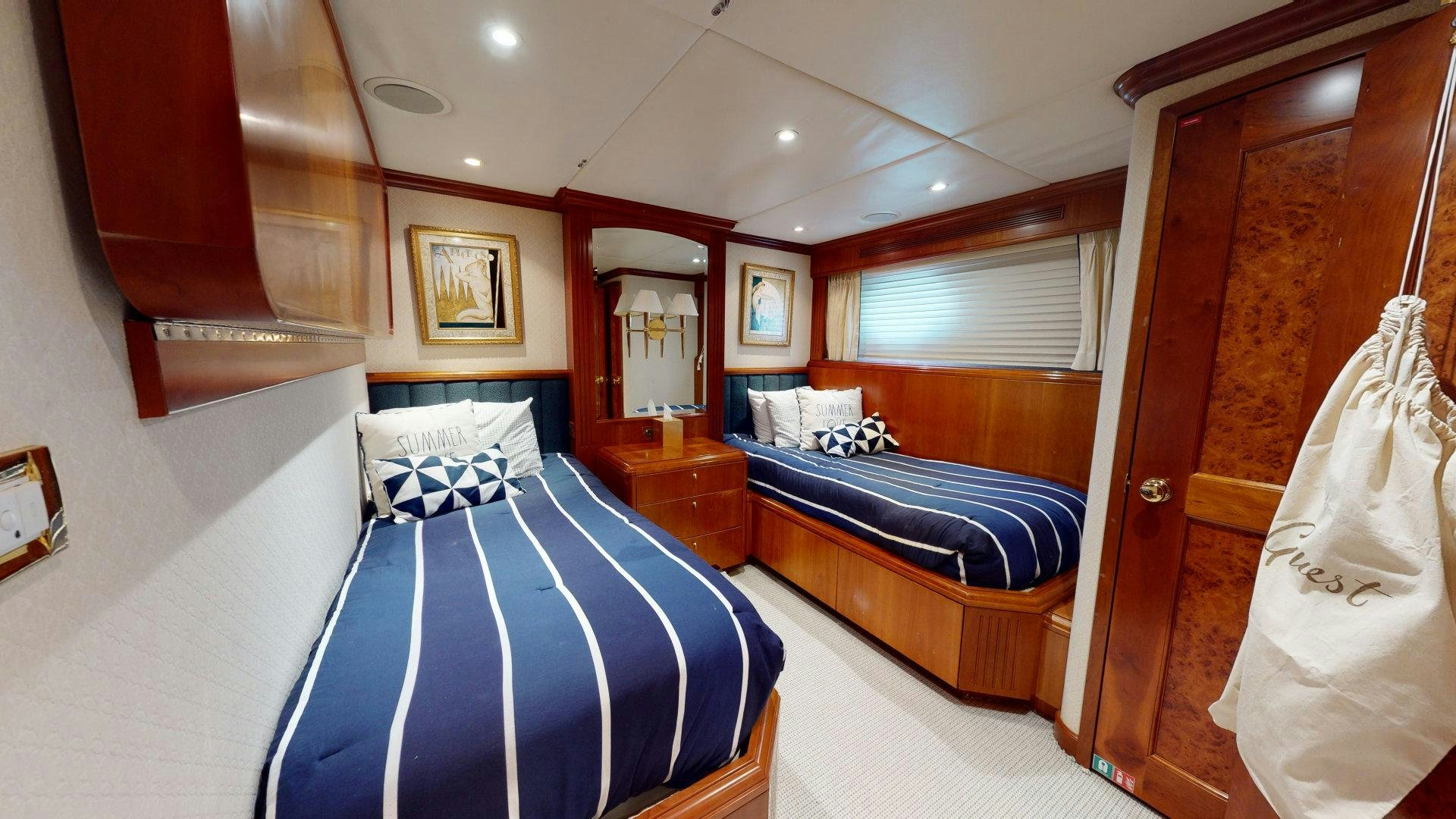 a room with a bed and a mirror aboard SUMMER LOVE Yacht for Sale