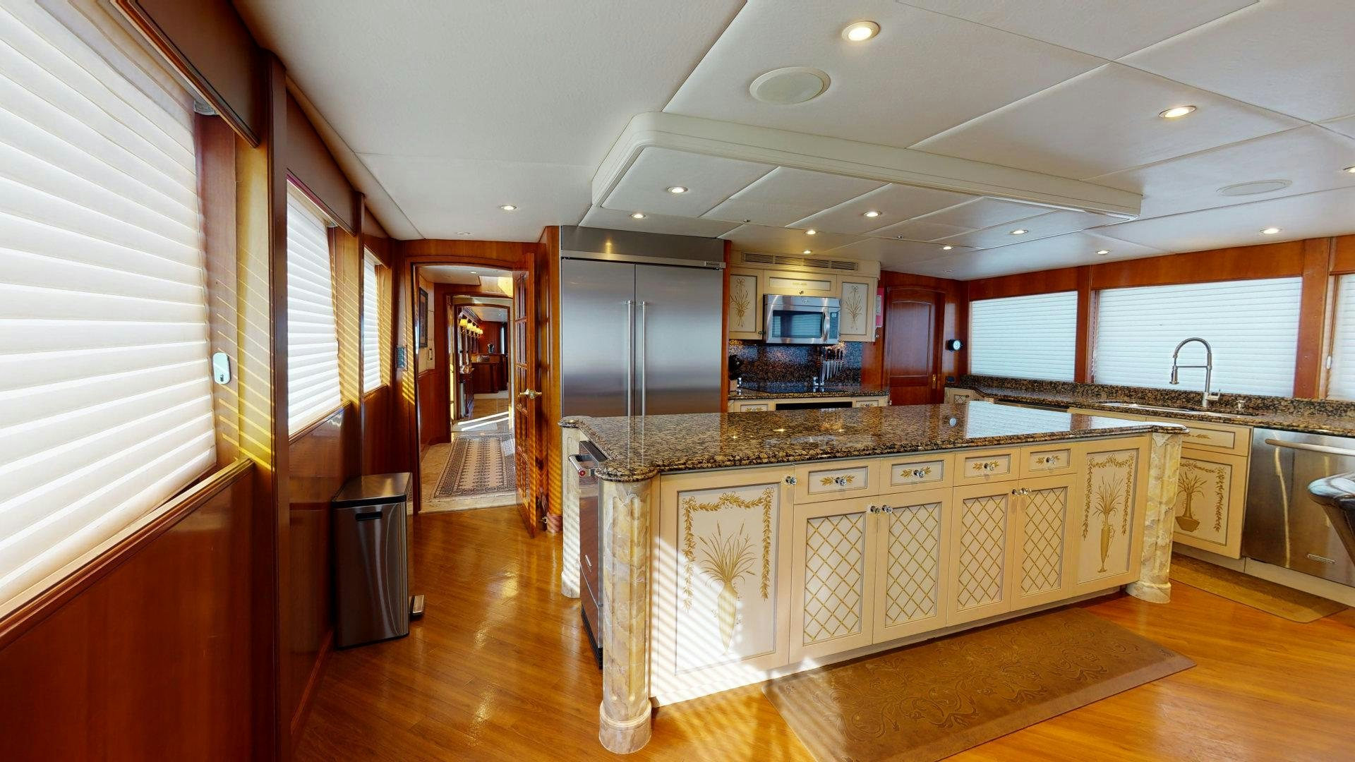 a large kitchen with a large island aboard SUMMER LOVE Yacht for Sale