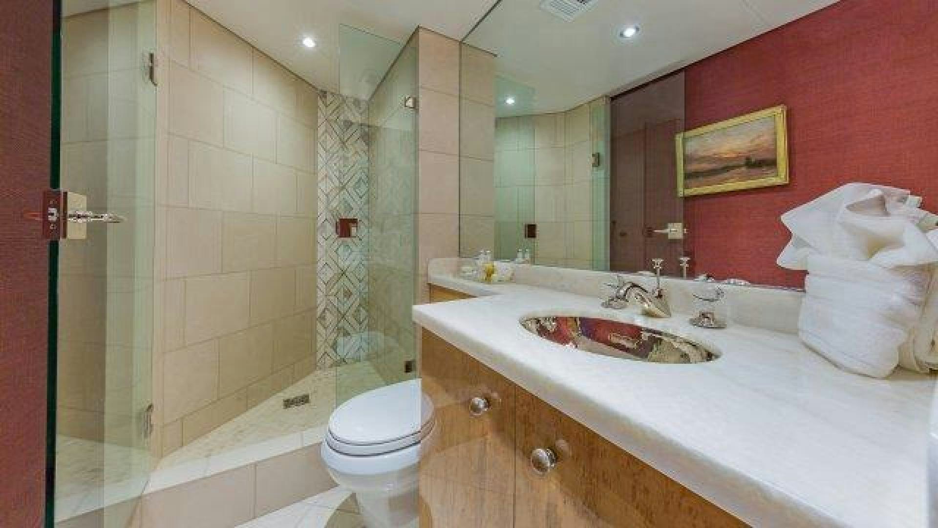 a bathroom with a sink and toilet aboard ARIADNE Yacht for Sale