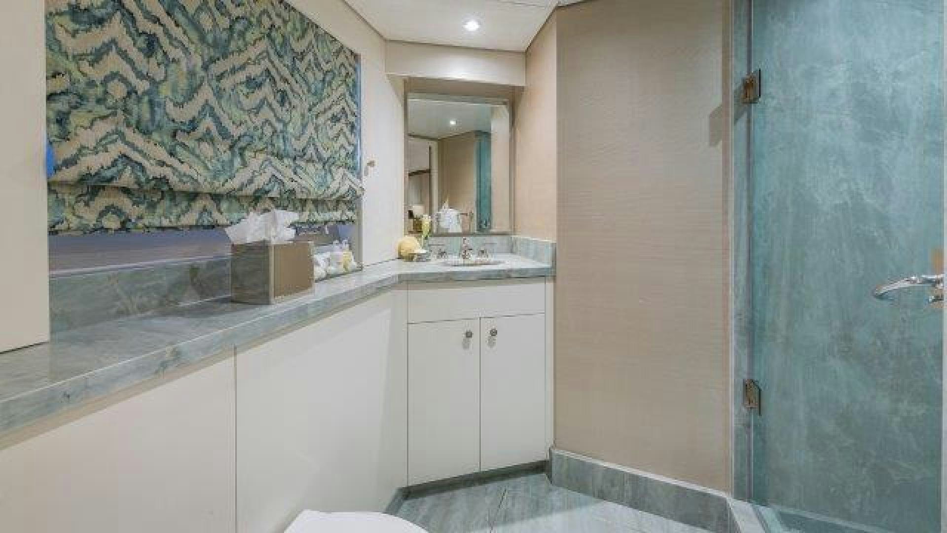 a bathroom with a sink and a mirror aboard ARIADNE Yacht for Sale