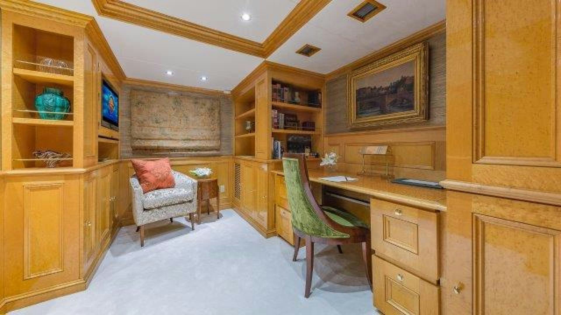 a room with a desk and a chair aboard ARIADNE Yacht for Sale