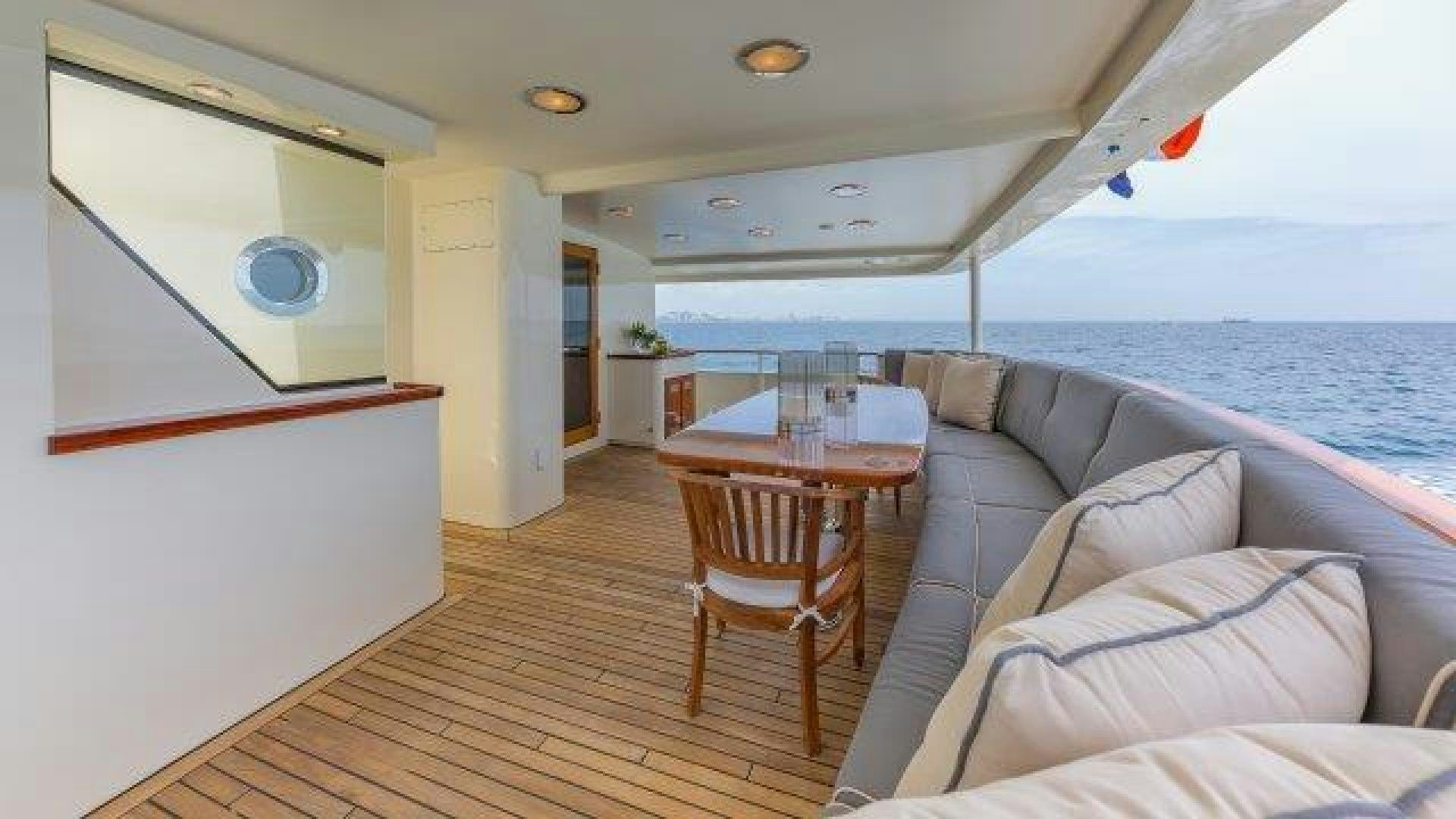 a boat with a table and chairs aboard ARIADNE Yacht for Sale