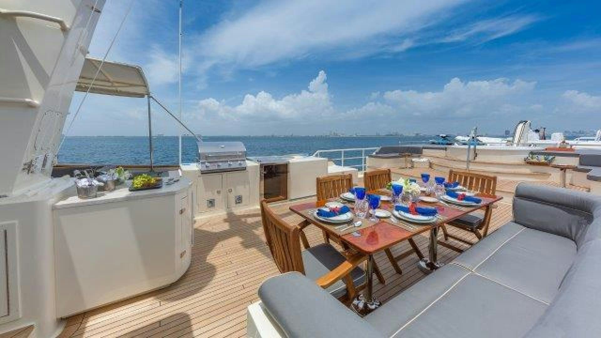 a room with a table and chairs aboard ARIADNE Yacht for Sale