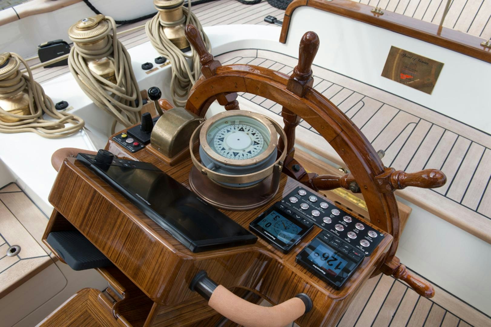 a hand holding a record player aboard SPIRIT OF VENICE Yacht for Sale