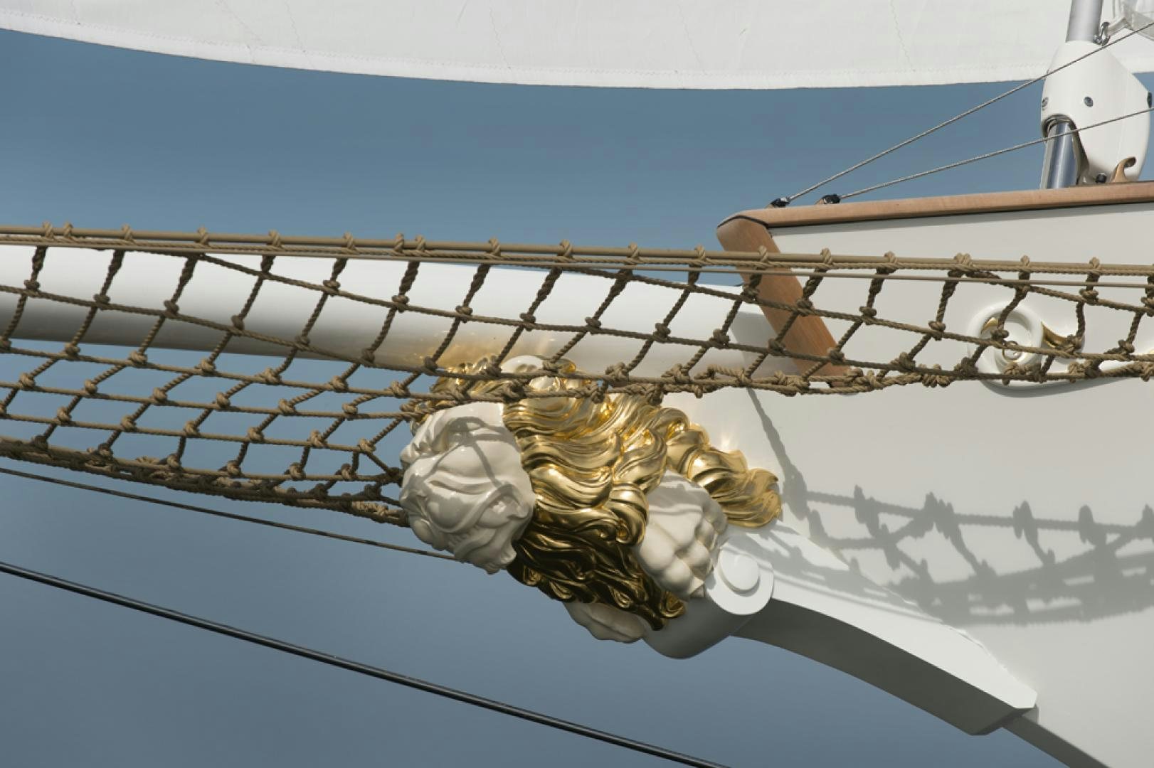 a golden statue on a metal fence aboard SPIRIT OF VENICE Yacht for Sale