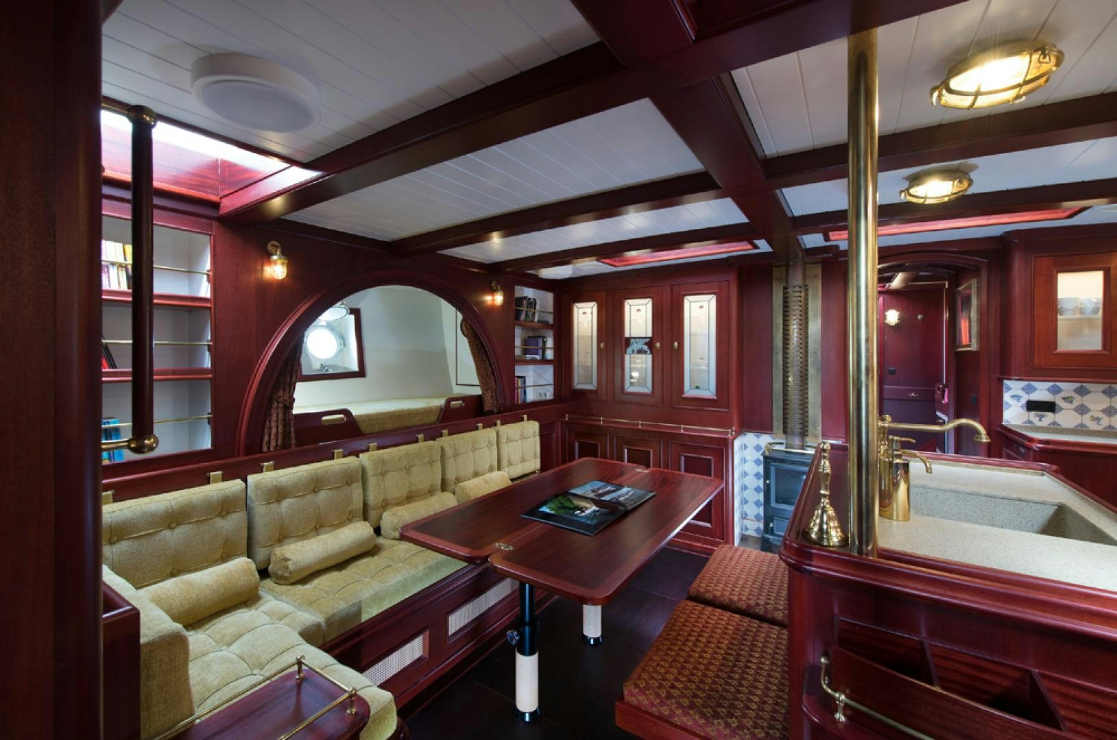 a room with a couch and a table aboard SPIRIT OF VENICE Yacht for Sale
