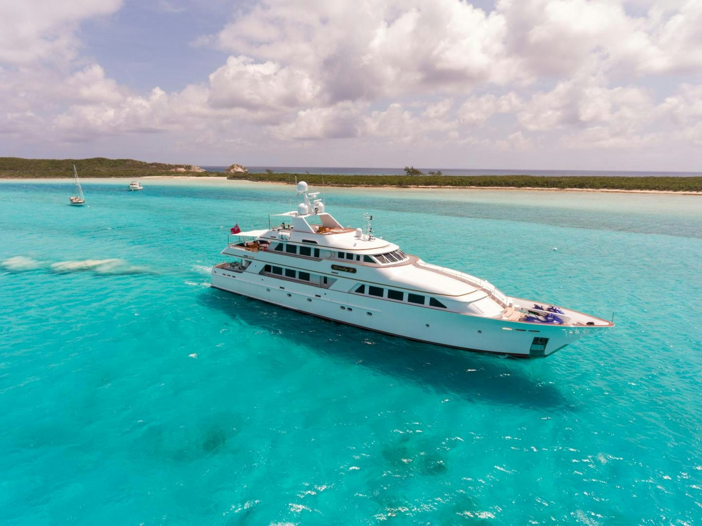 a white boat in the water aboard LADY J Yacht for Sale