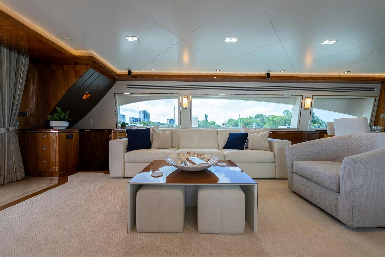 a living room with a large window aboard ENCORE Yacht for Sale