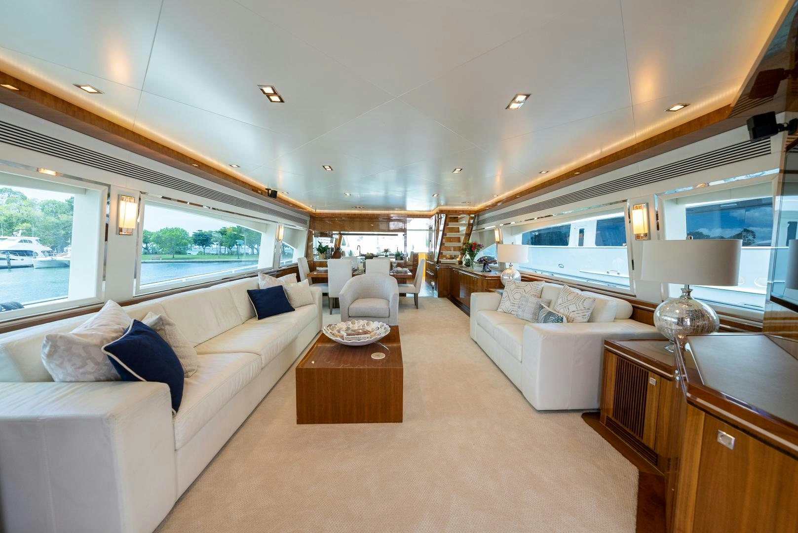 a living room with a large window aboard ENCORE Yacht for Sale
