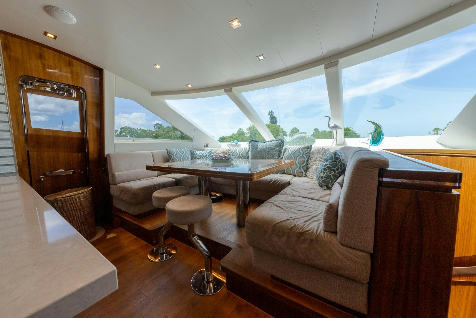 a living room with a large window aboard ENCORE Yacht for Sale